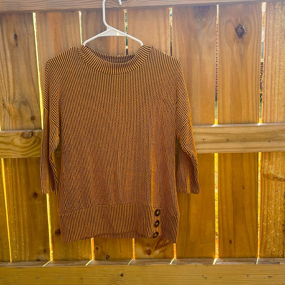 Orange and black long sleeve shirt
